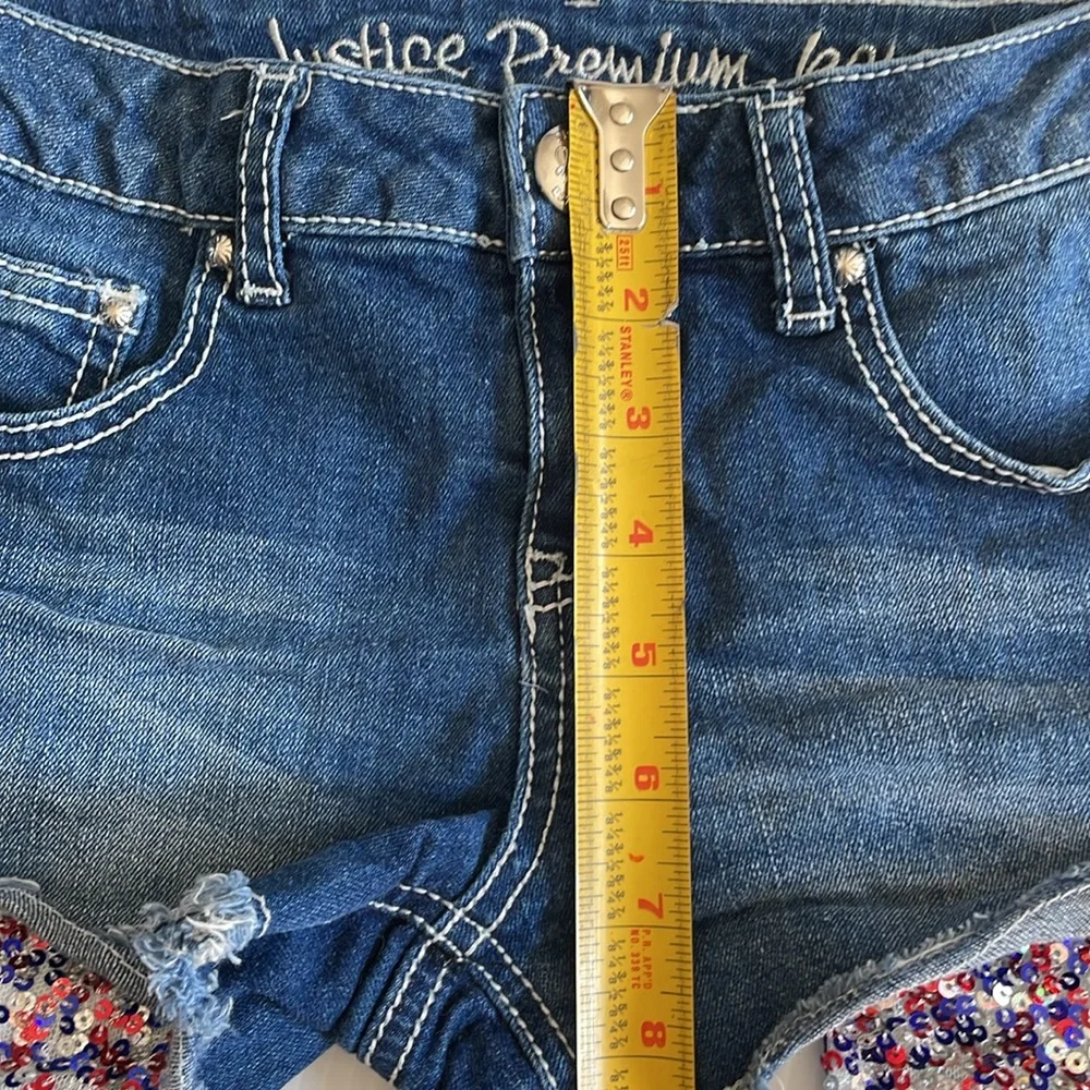 Justice denim jean shorts with red, blue & silver sequins. Girls size 10